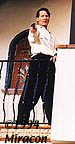 Rainman tries to get a bead on his target from the balcony.